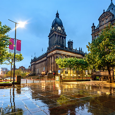 Grand buildings in Leeds city centre in the rain