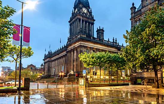 Grand buildings in Leeds city centre in the rain